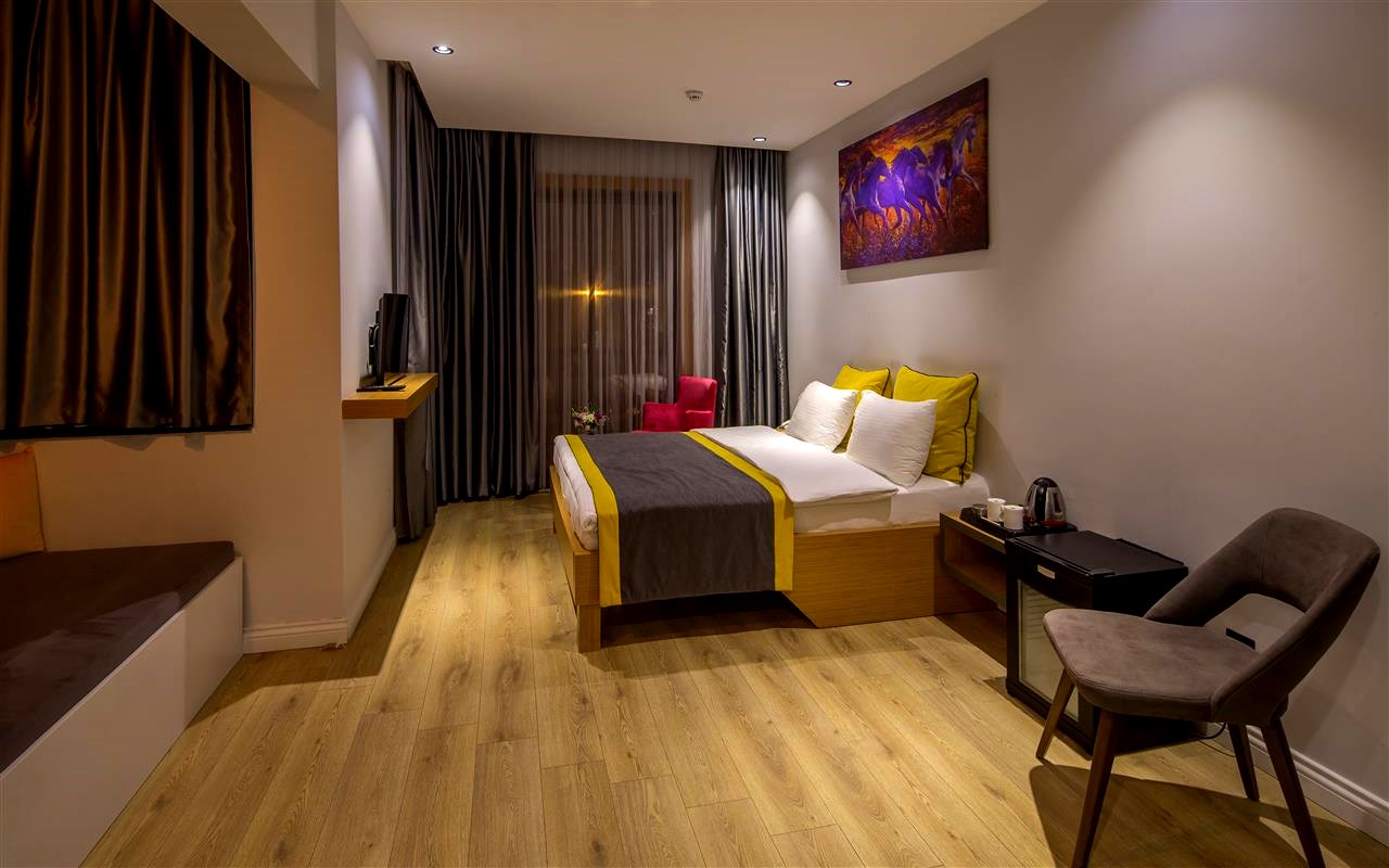 Espina Hotel İptal Edilemez Deluxe Suit Resimleri