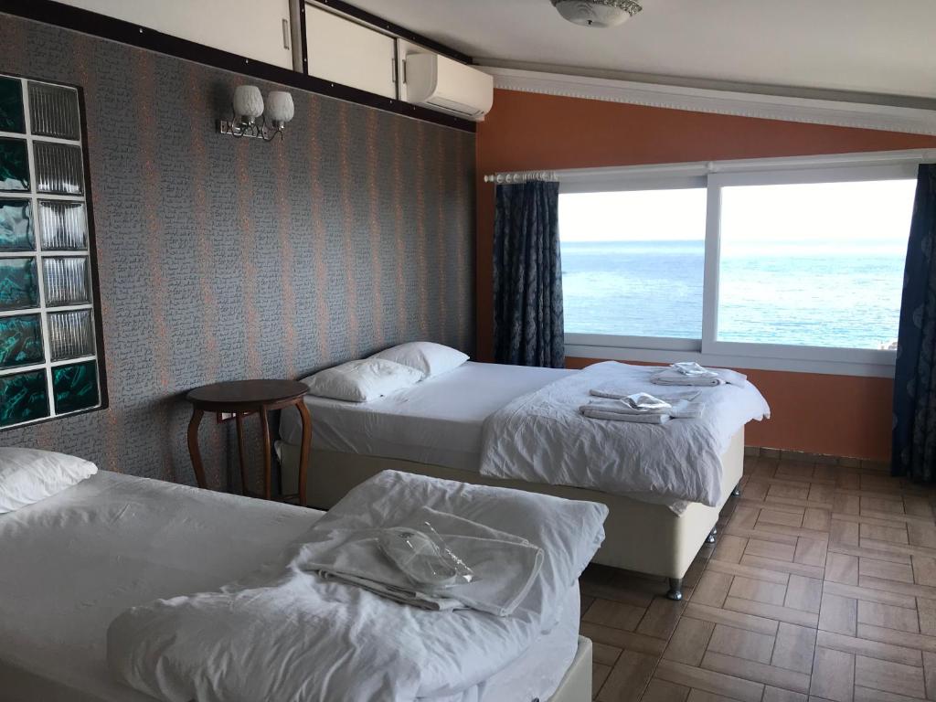 Tayfun Otel Mordo?an Dört Kişilik Deniz Manzaralı Apart Oda Resimleri